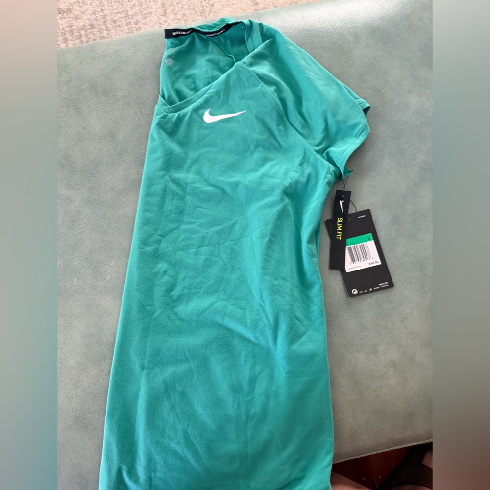 Nike women’s ' Teal Dri-FIT Tennis Top